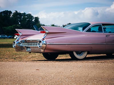 Tail of pink classic car