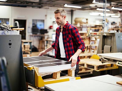 Man using table machinery